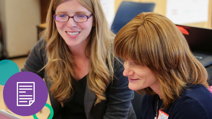 Two teachers smiling