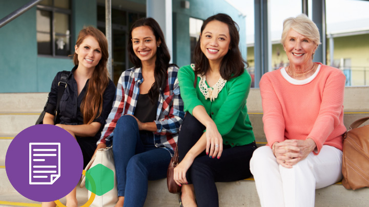 Four teachers smiling