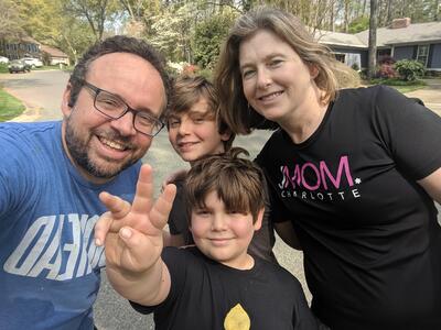 Family smiling at camera