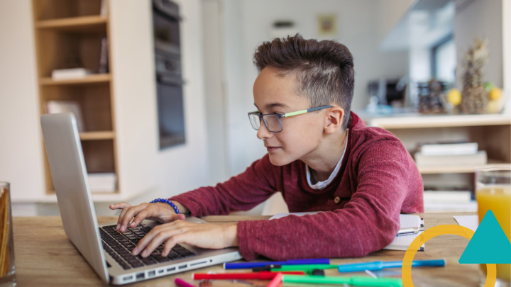 Student using laptop at home