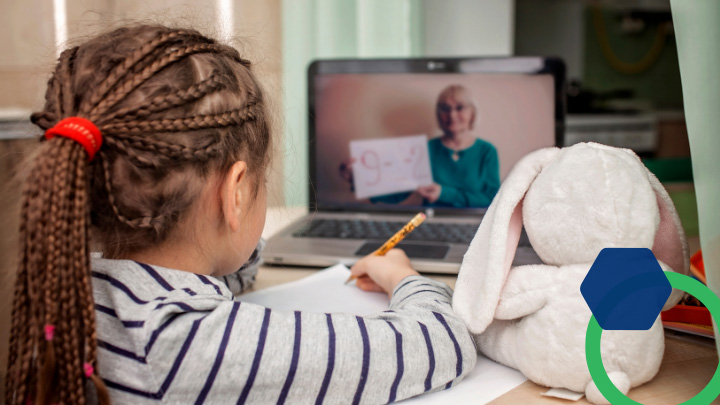 Student watching math class on laptop