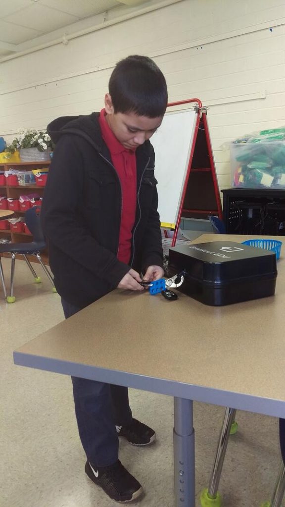 Student with Breakout Box