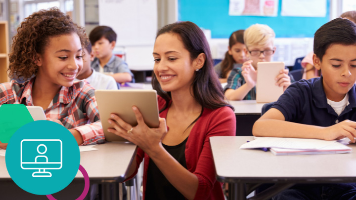 Teacher helping student