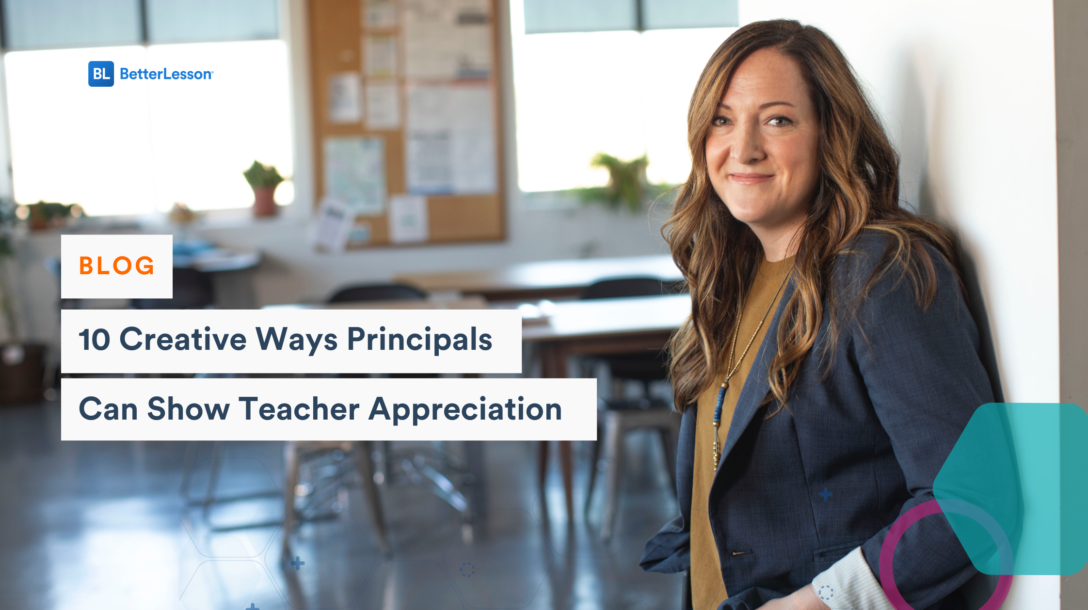 Smiling teacher standing at the door to her classroom