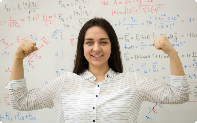 Student in front of whiteboard with math equations