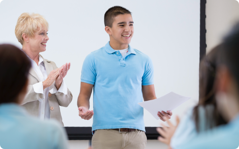 Student presenting in classroom